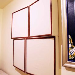 Bordered angular acoustic panels for acoustic treatment